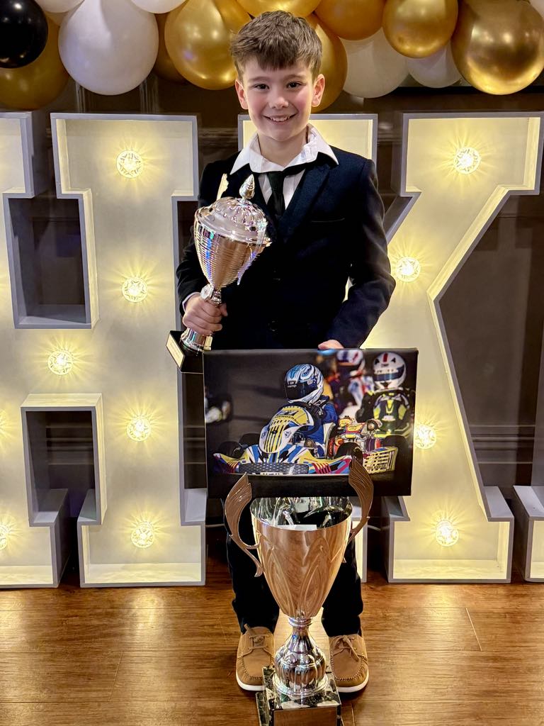 Sawyer holding the Mark Hines Award